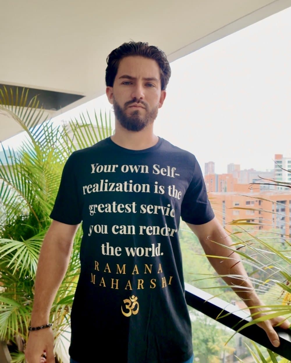 Damian Velasquez, founder of Ascetic Aesthetics, wearing the Ramana Maharshi tee